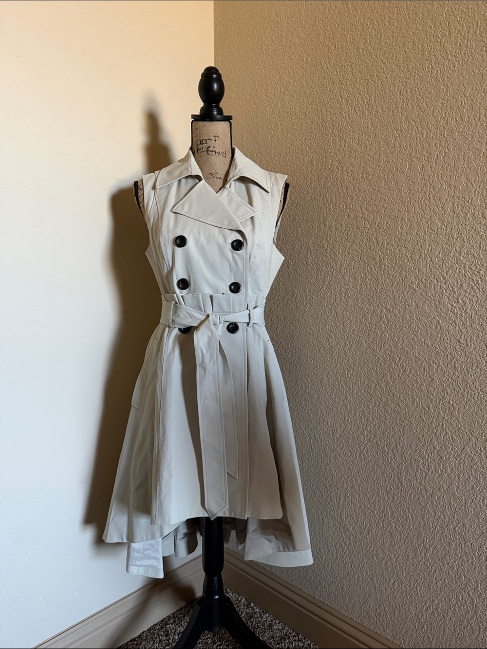 bebe Sleeveless High-Low Trench